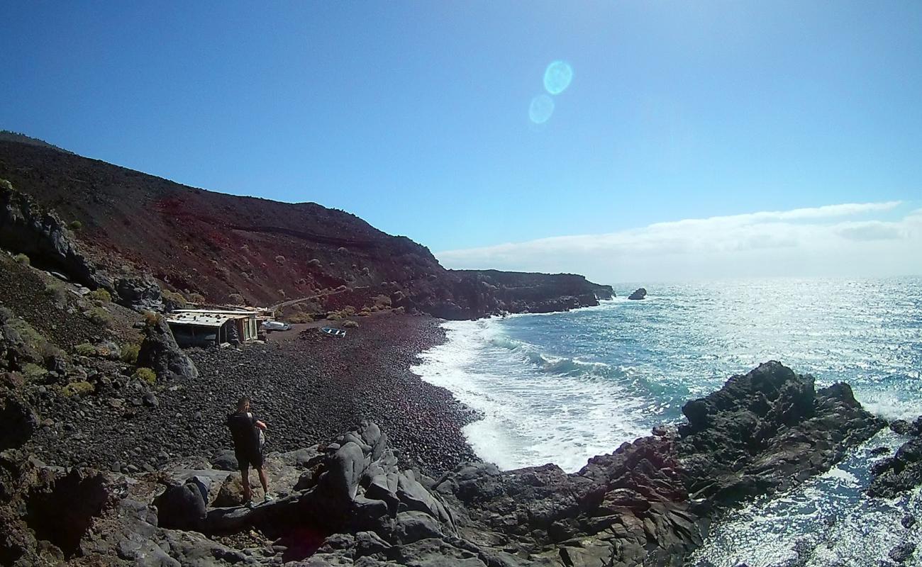 Photo of El Puertito with gray pebble surface