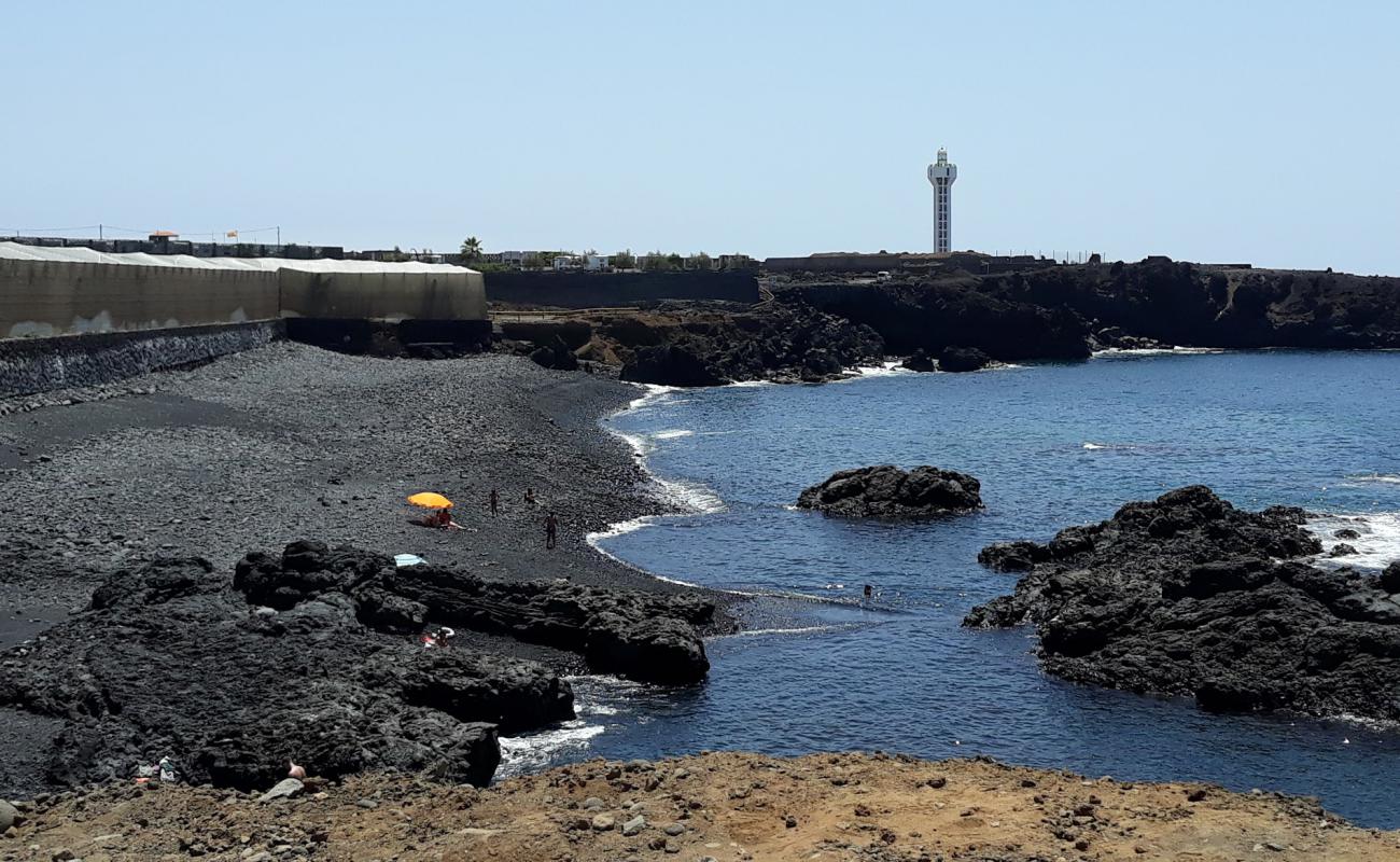 Photo of Playa Escondida with white sand &  rocks surface