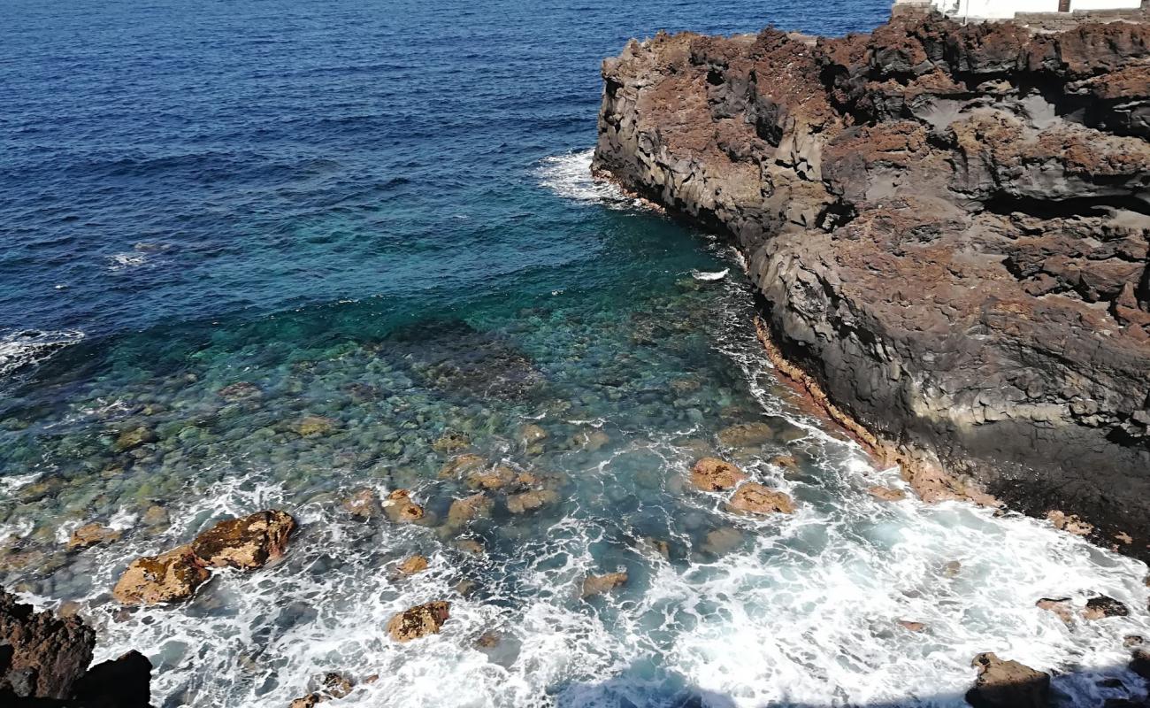 Photo of Playa de los Palos with rocks cover surface