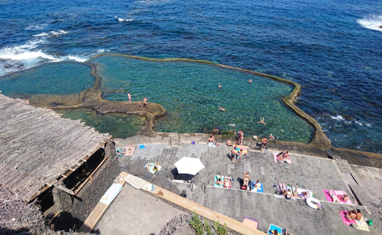 Photo of Natural Pool La Maceta with concrete cover surface