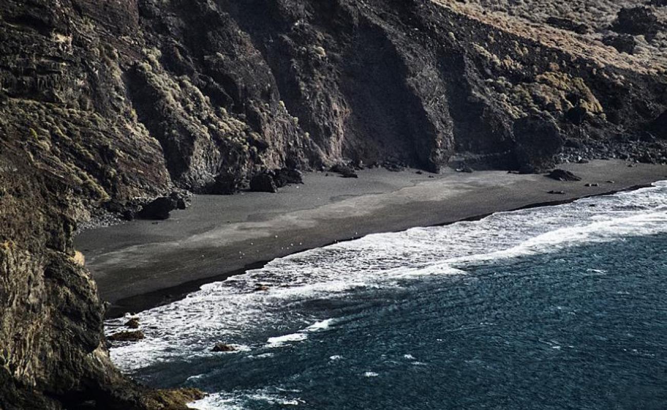 Photo of Playa de Heredia with gray pebble surface