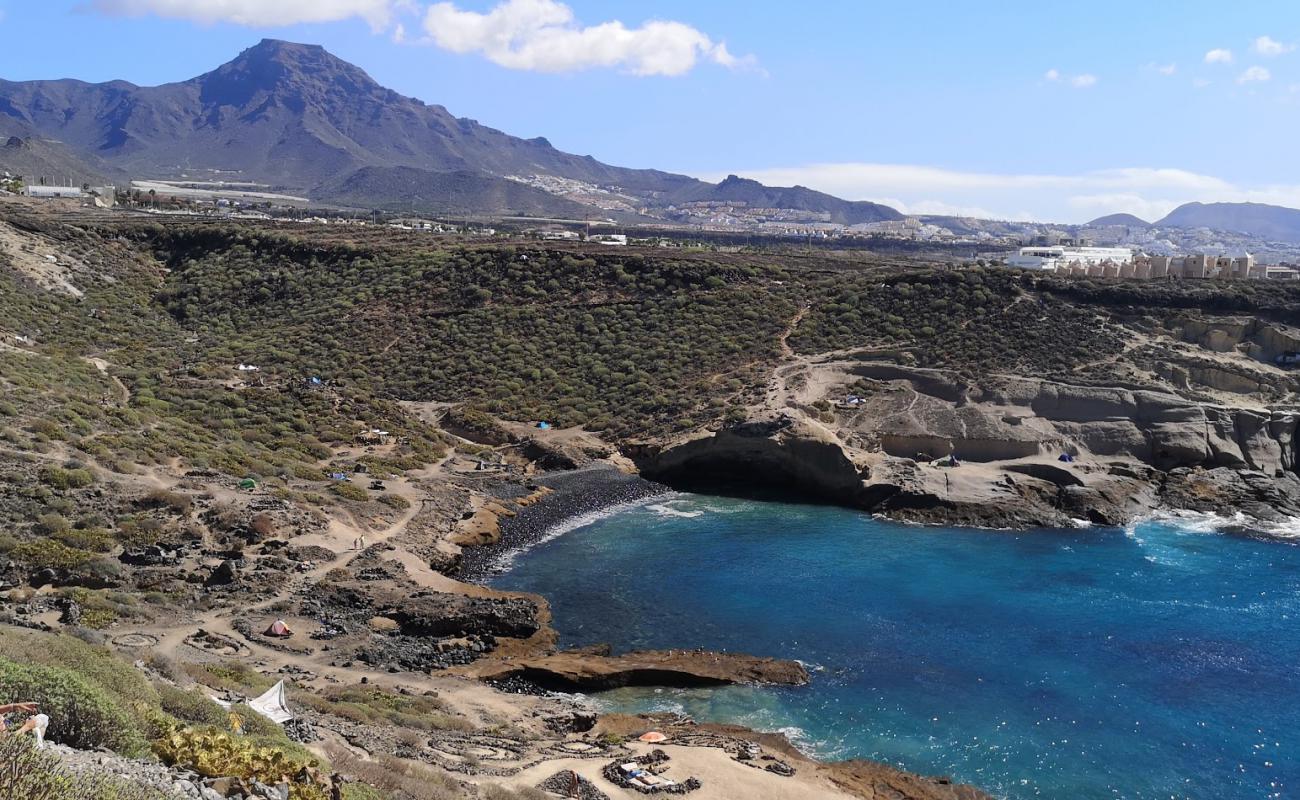 Photo of Playa de los Morteros with gray sand &  pebble surface