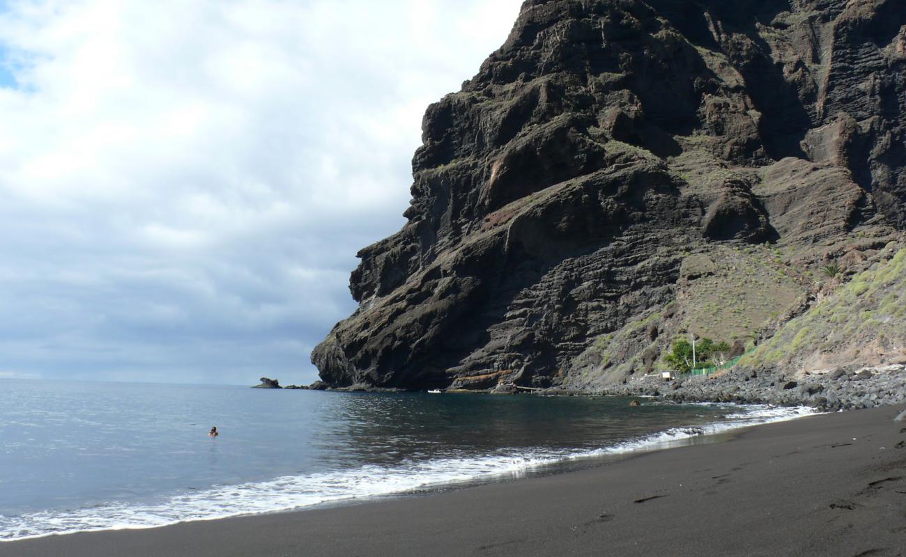 Photo of Playa de Masca with gray sand surface