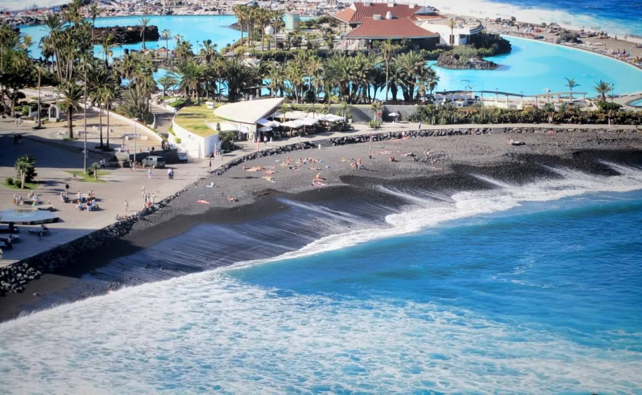 Photo of Playa de Martianez with gray sand &  pebble surface