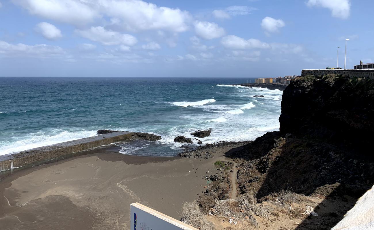 Photo of Playa El Barranquillo with gray sand &  rocks surface