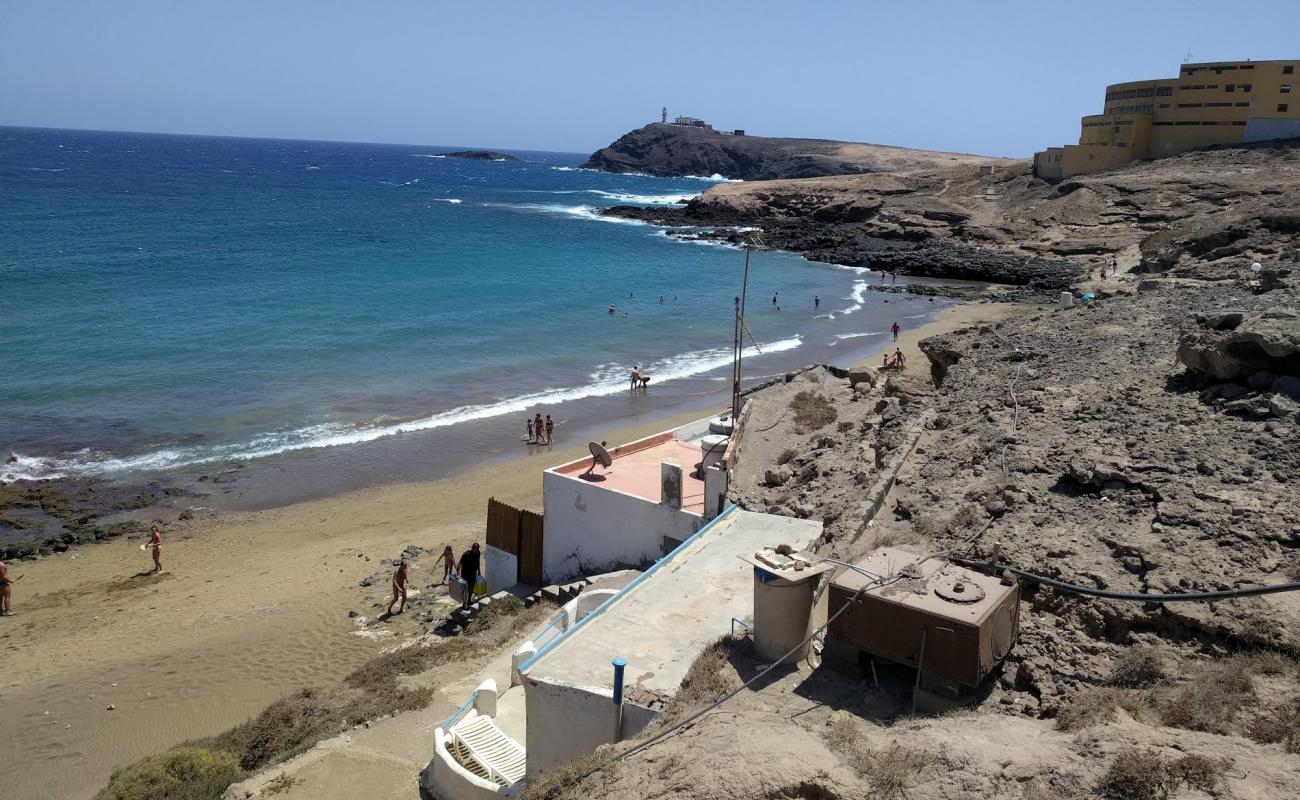 Photo of Playa del Cabron with brown sand surface