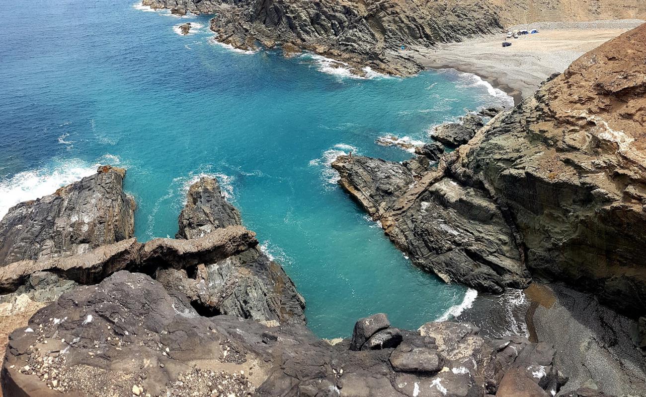 Photo of Playa de los Mozos with gray sand &  pebble surface