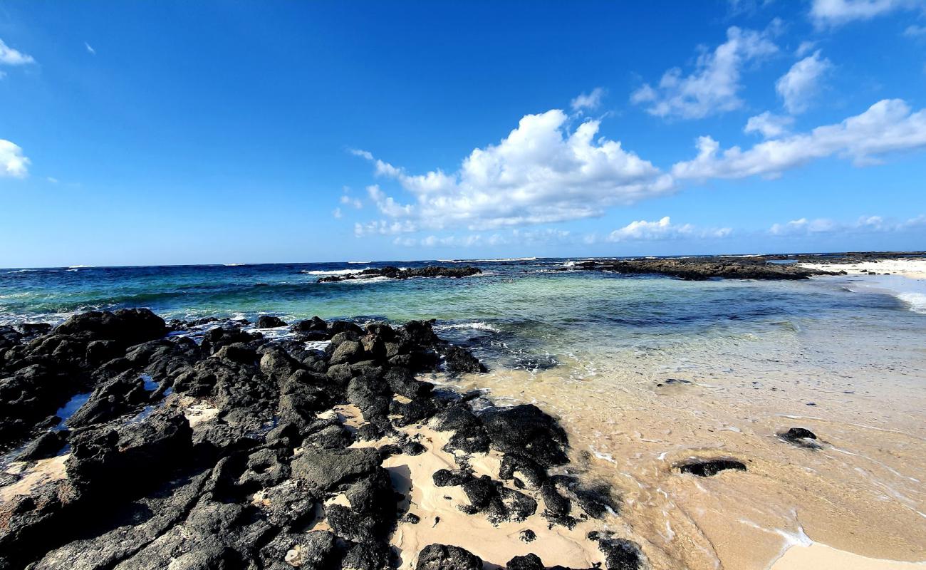 Photo of Playa La Barra with bright sand & rocks surface