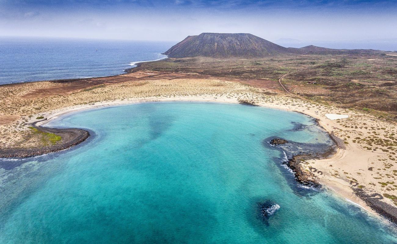 Photo of Playa De La Concha De Lobos with bright sand surface