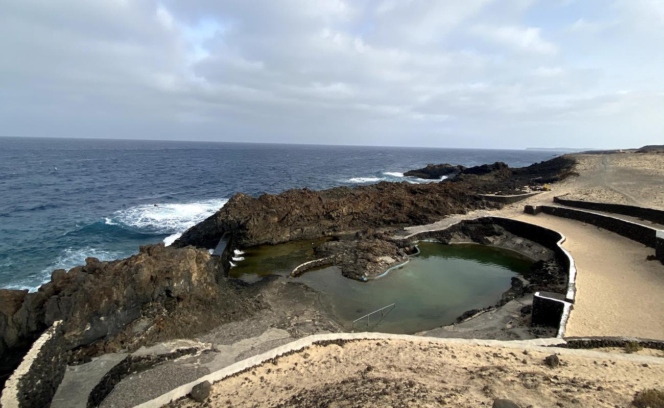 Photo of Piscina Natural Coloseo with rocks cover surface