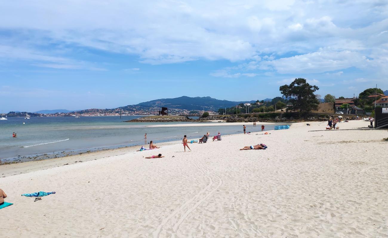 Photo of Praia de Santa Marta with white sand surface