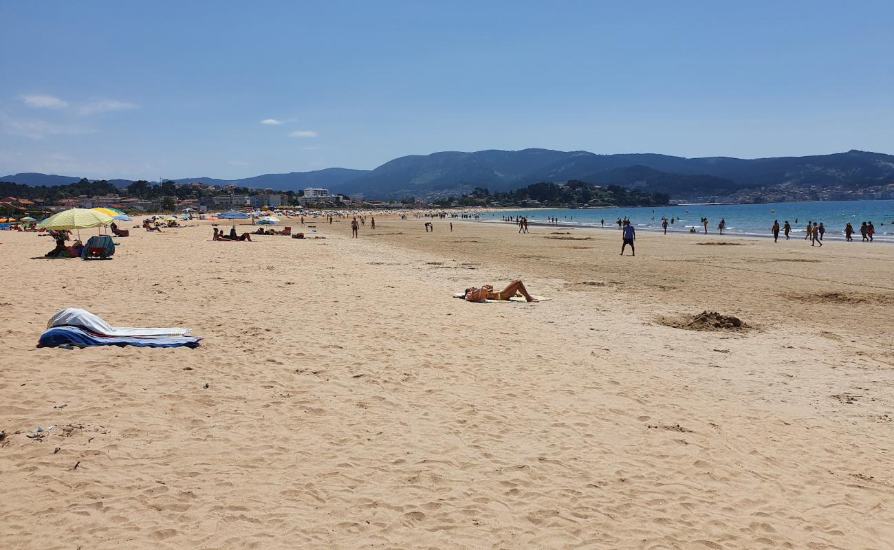 Photo of Praia de Panxon with bright sand surface