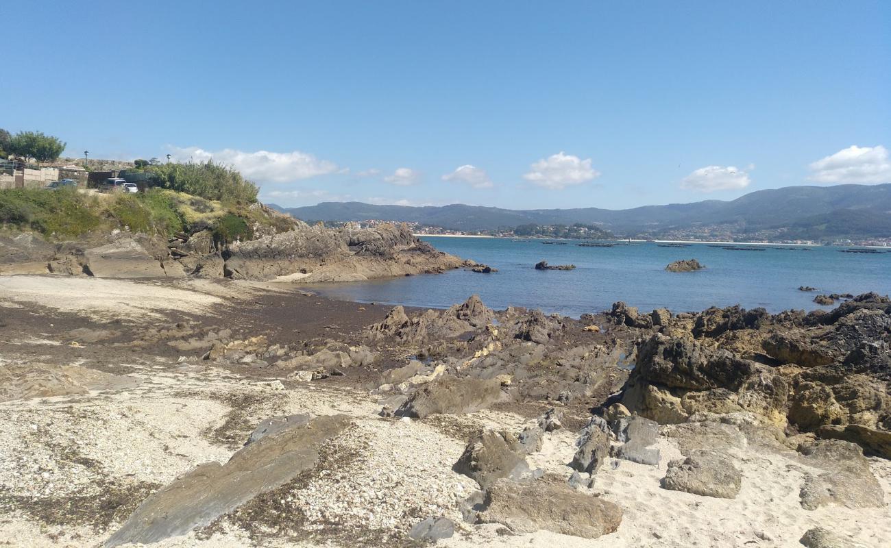 Photo of Praia de Portocelo with white sand surface