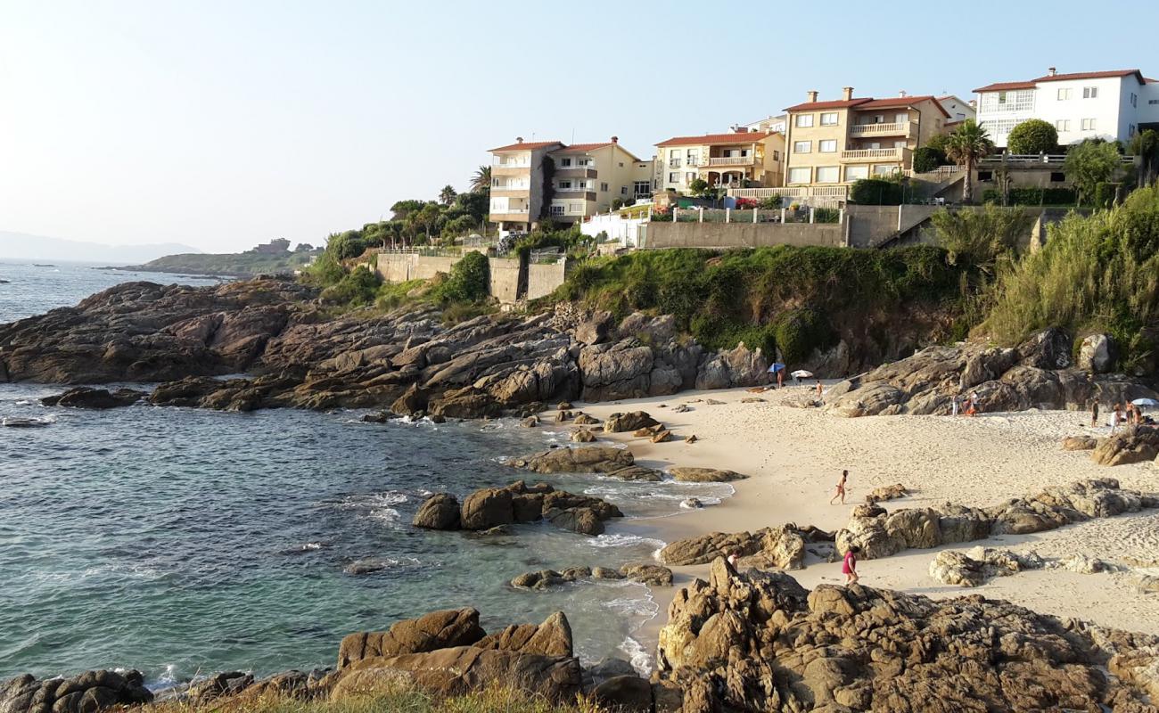 Photo of Playa de Fortinon with white sand surface