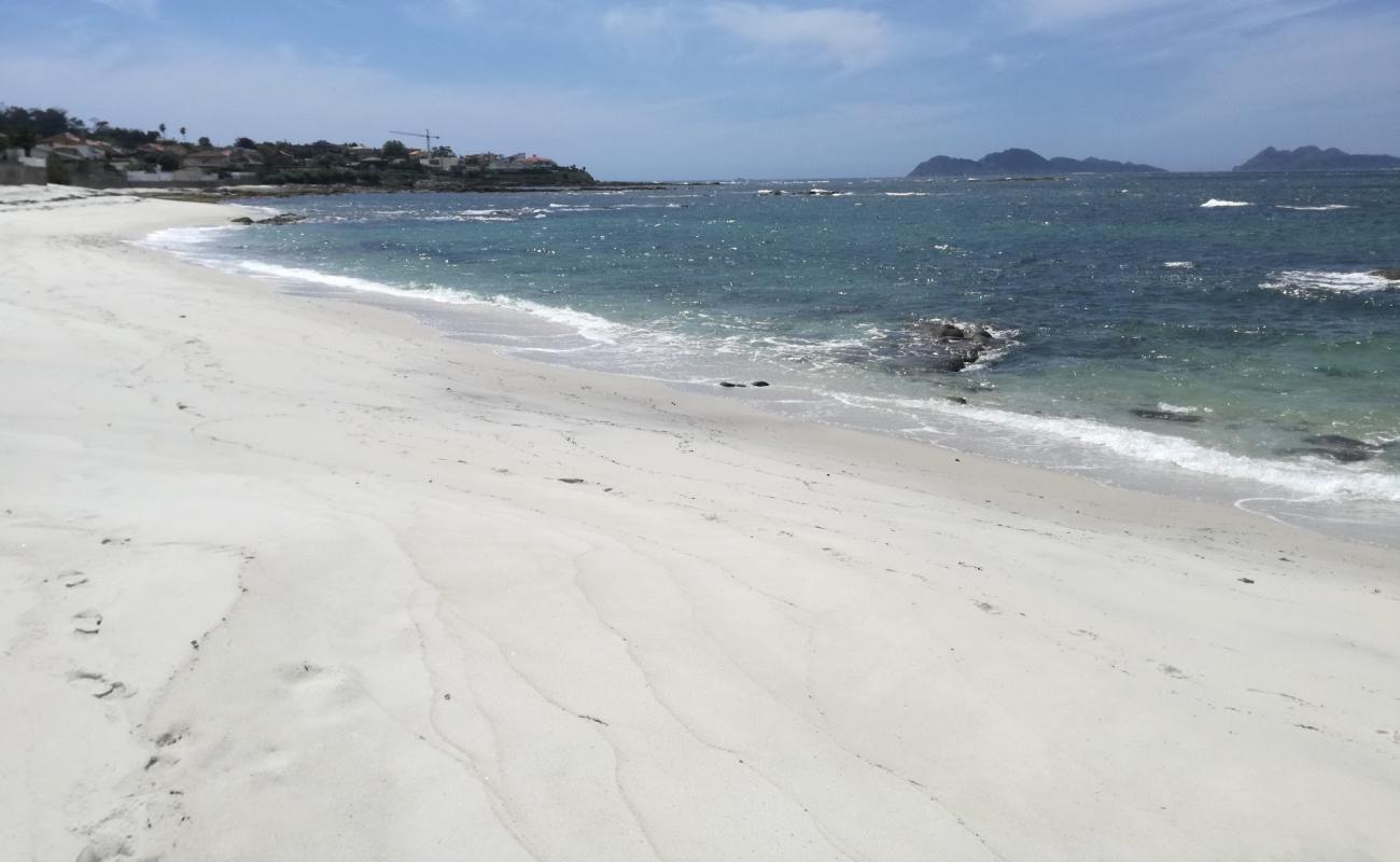 Photo of Praia de Fuchinos with white fine sand surface