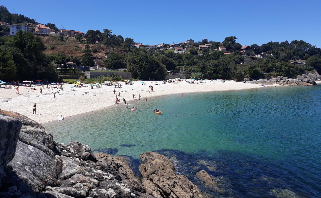 Photo of Praia de San Xian with white fine sand surface