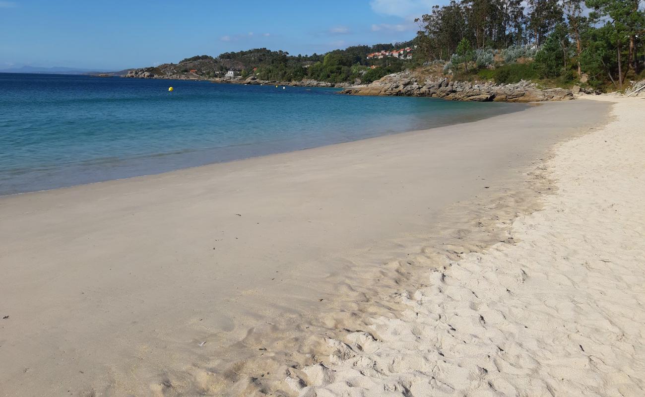 Photo of Areacova beach with bright fine sand surface