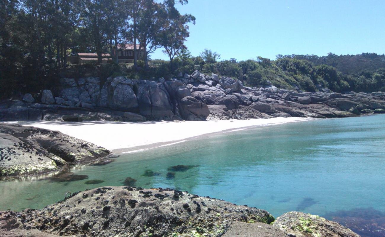 Photo of Praia Sartaxens with bright fine sand surface