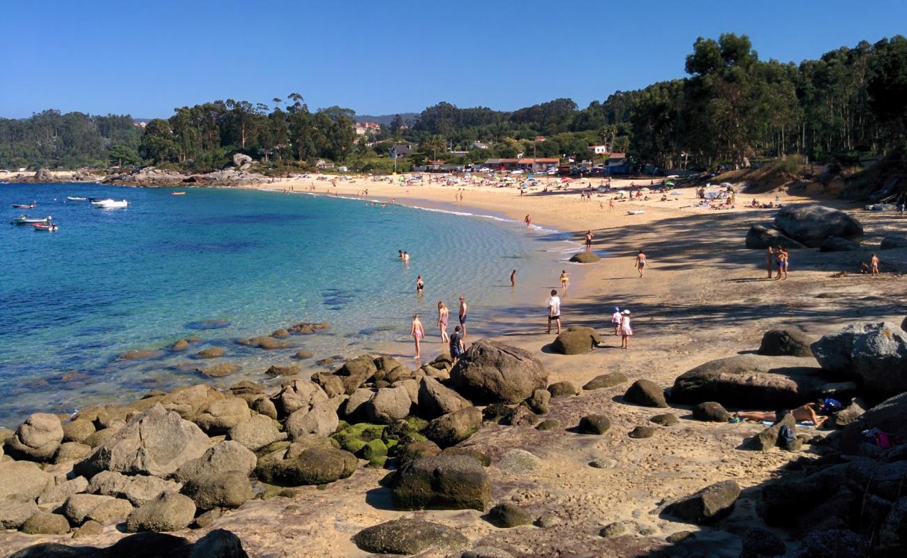 Photo of Praia Da Mourisca with bright fine sand surface