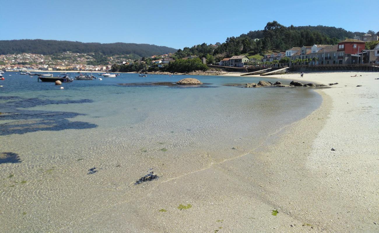 Photo of Praia de Beluso with bright sand surface