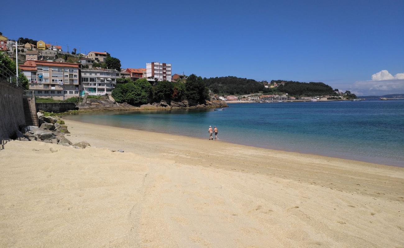 Photo of Praia de Bueu with bright sand surface