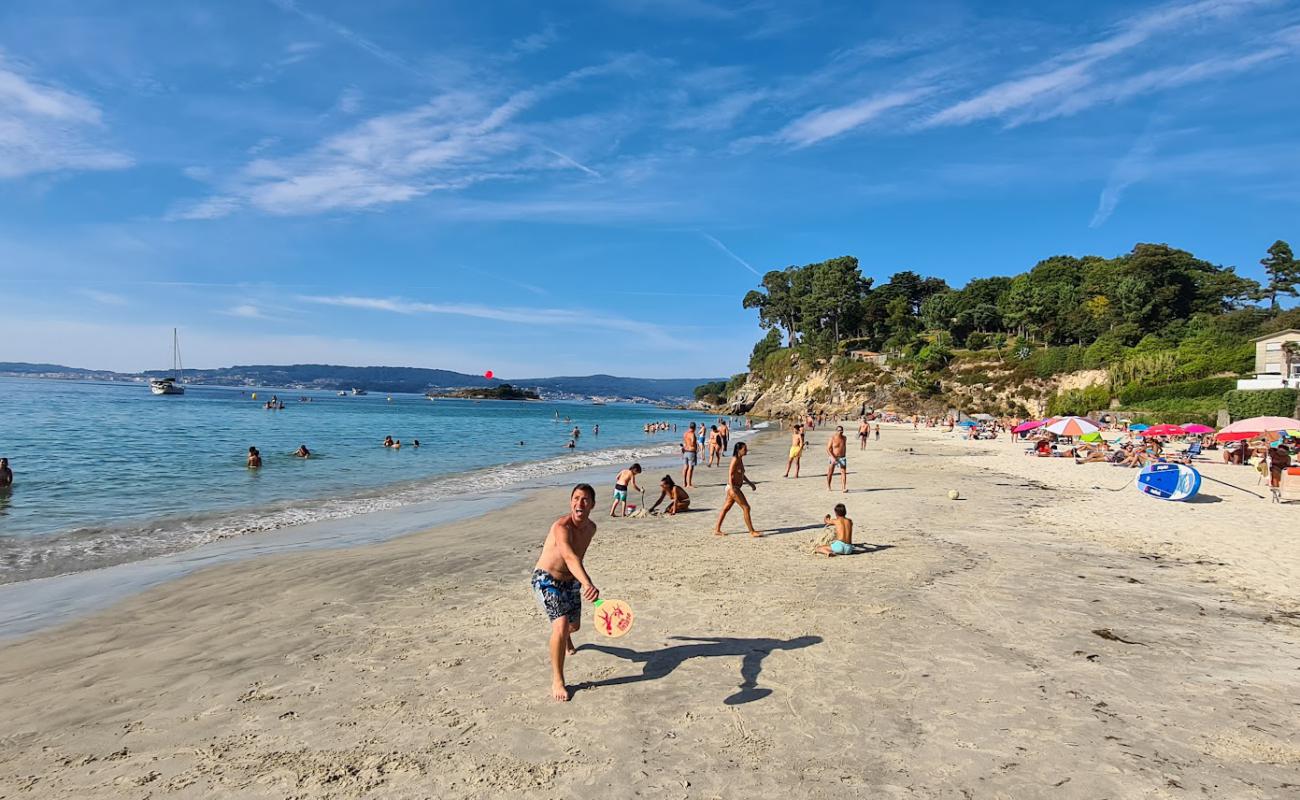 Photo of Praia de Lapaman with white fine sand surface