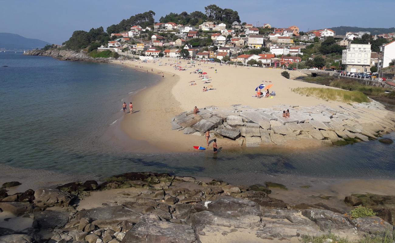 Photo of Praia de Loira with white fine sand surface