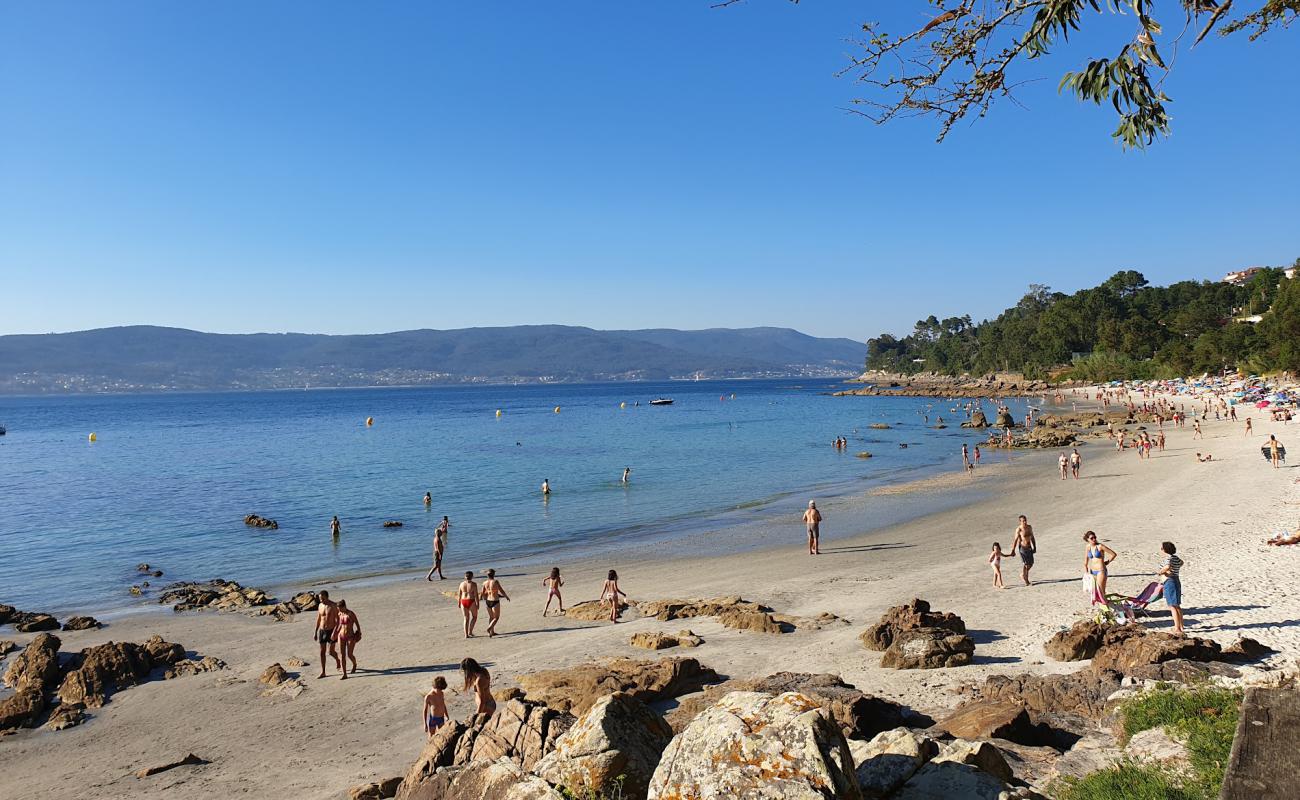 Photo of Praia de Aguete with white fine sand surface