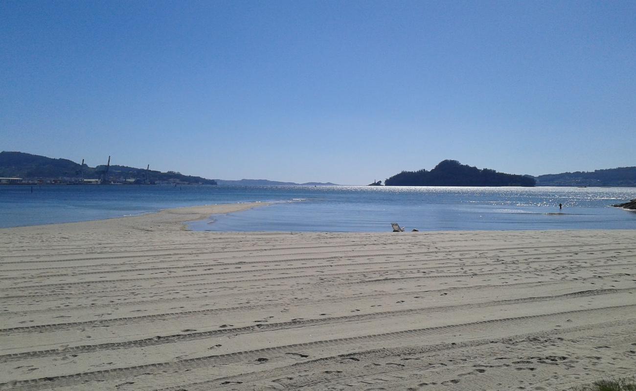 Photo of Praia de Lourido with white sand surface