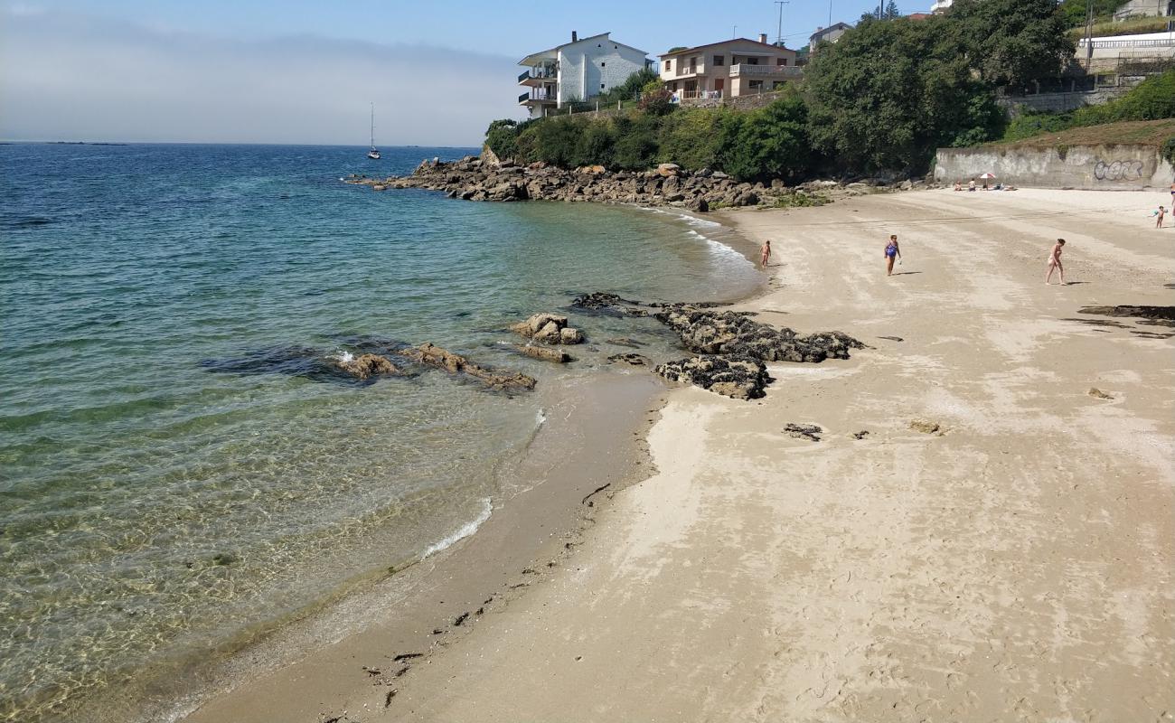 Photo of Praia de Fontemaior with white sand surface