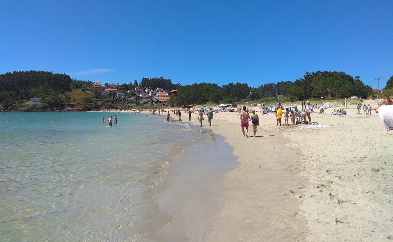 Photo of Canelas beach with white fine sand surface