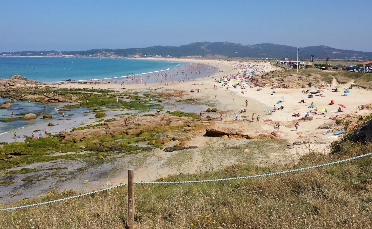 Photo of Lanzada Beach with bright fine sand surface