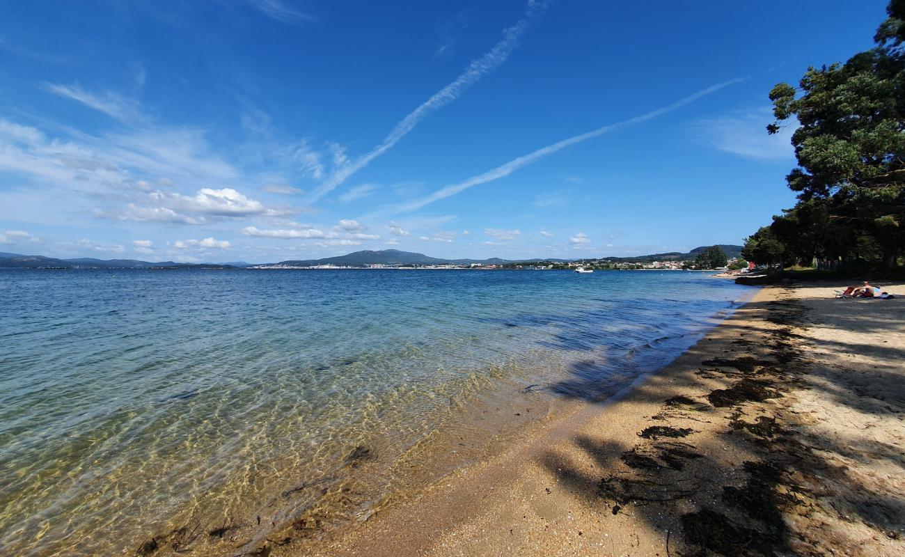 Photo of Praia das Sinas II with bright sand surface