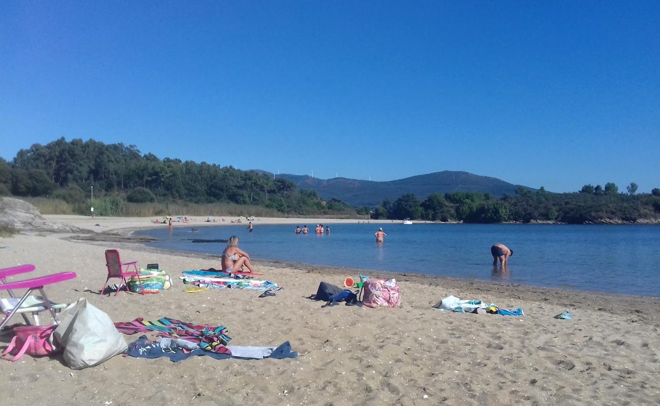 Photo of Porron beach with white sand surface