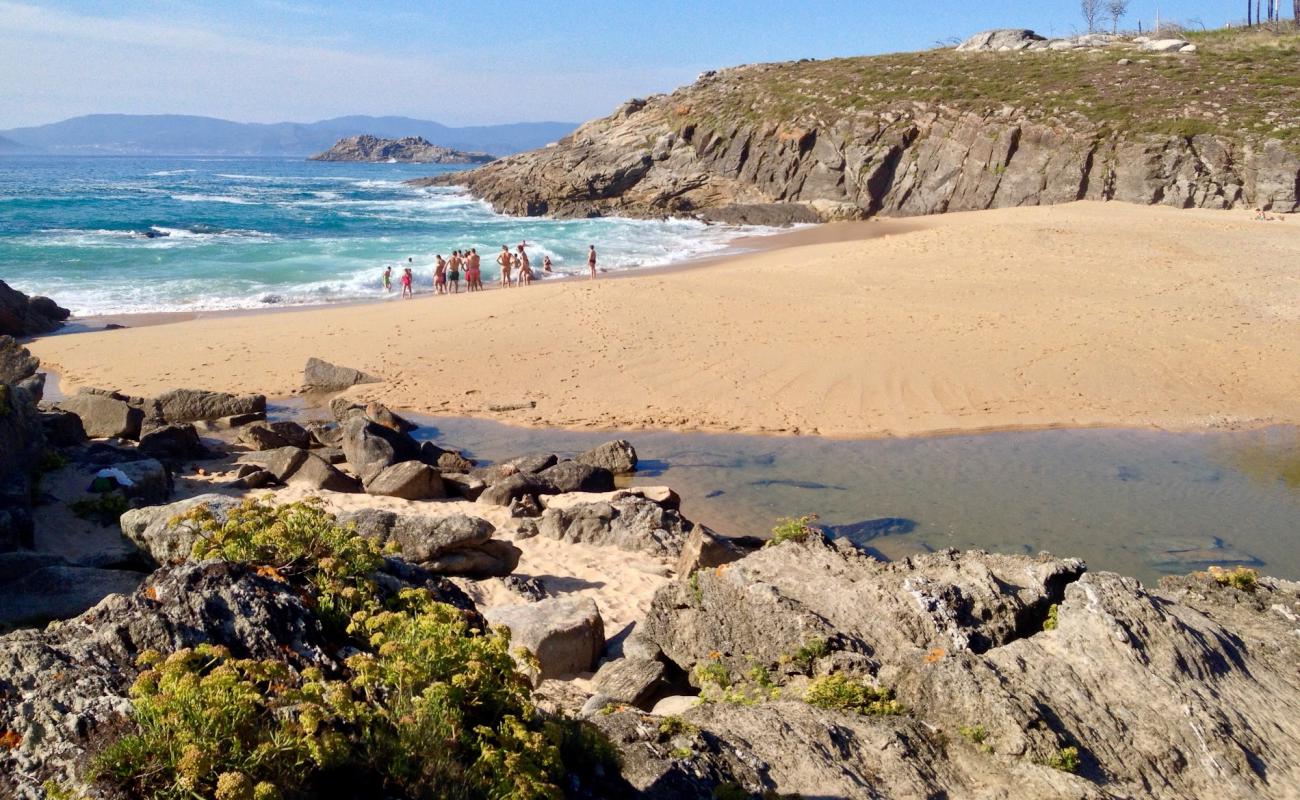 Photo of Dique beach with bright fine sand surface