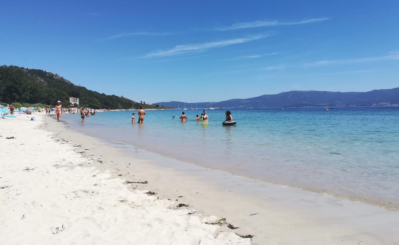 Photo of Praia de San Francisco with white fine sand surface