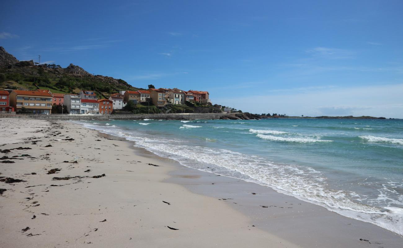 Photo of Praia do Pindo with white fine sand surface