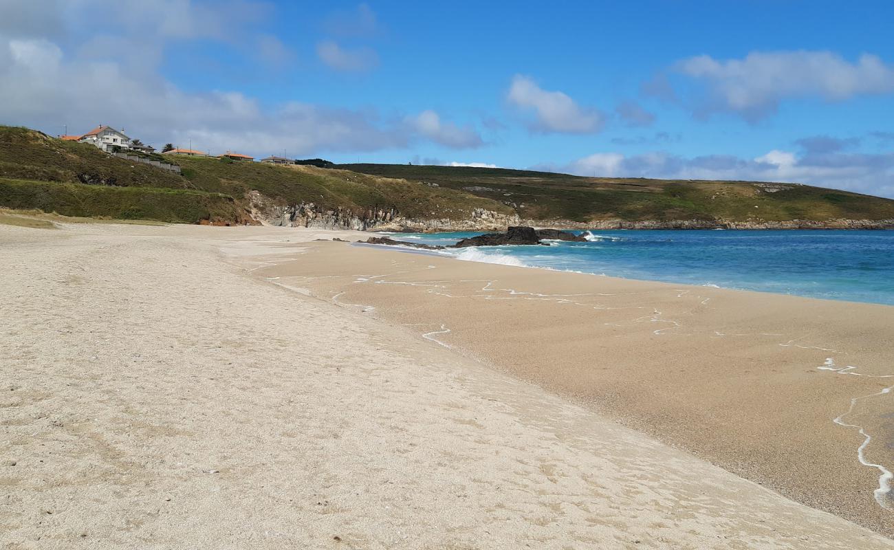 Photo of Playa de Seiruga with white sand surface