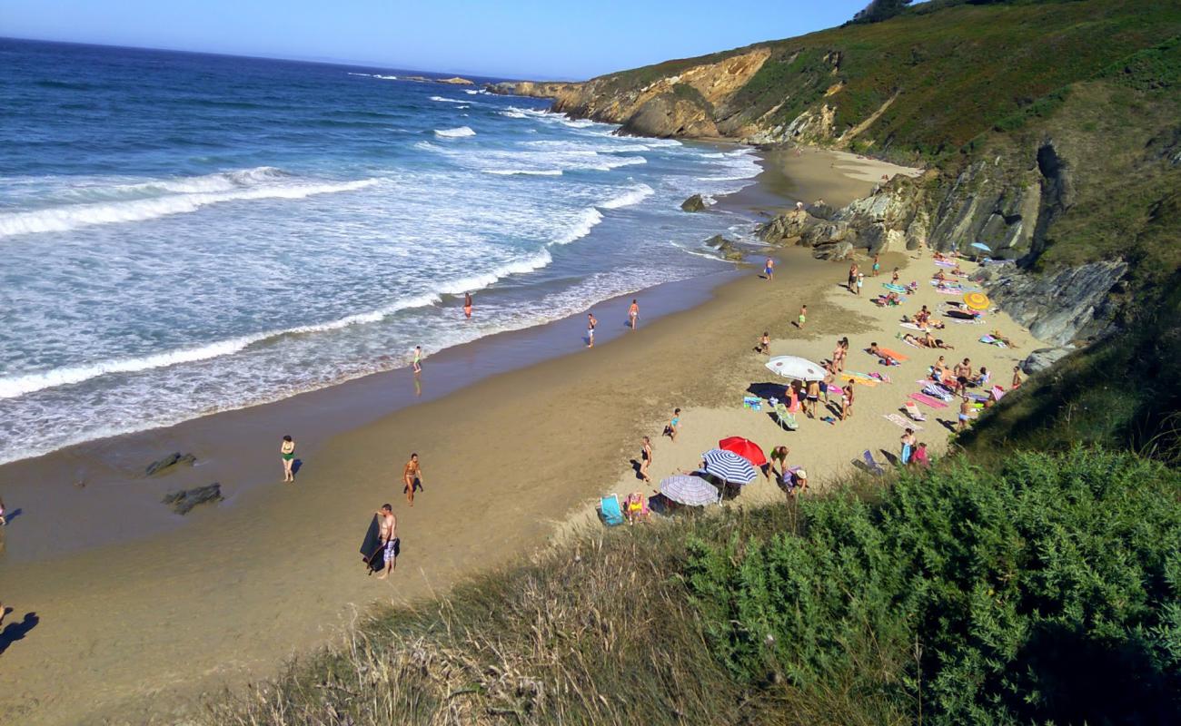 Photo of Praia das Torradas with bright fine sand surface