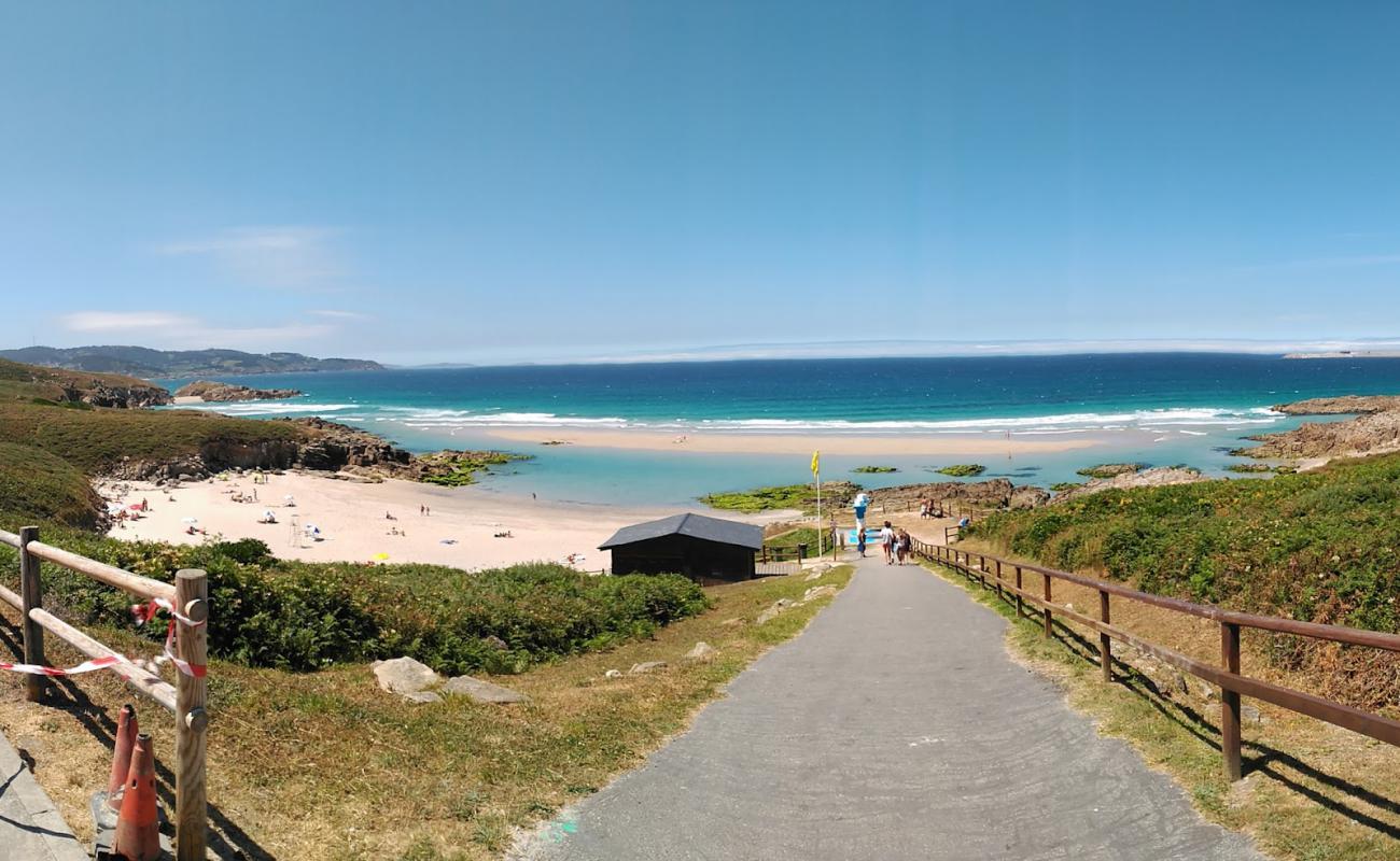 Photo of Praia de Repibelo with white sand surface