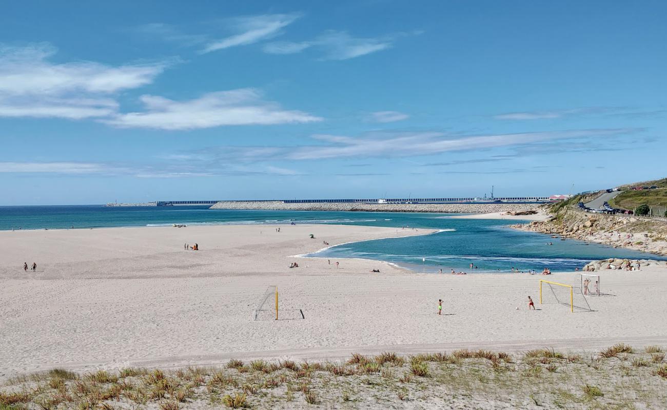 Photo of Praia de Sabon with white sand surface