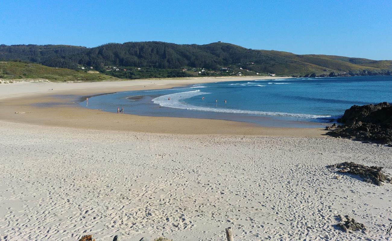 Photo of Praia de Doninos with white fine sand surface