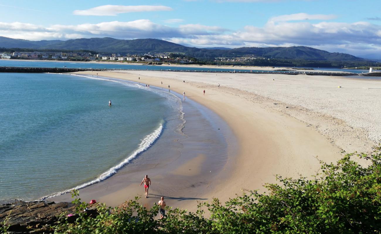 Photo of Praia da Rapadoira with bright fine sand surface