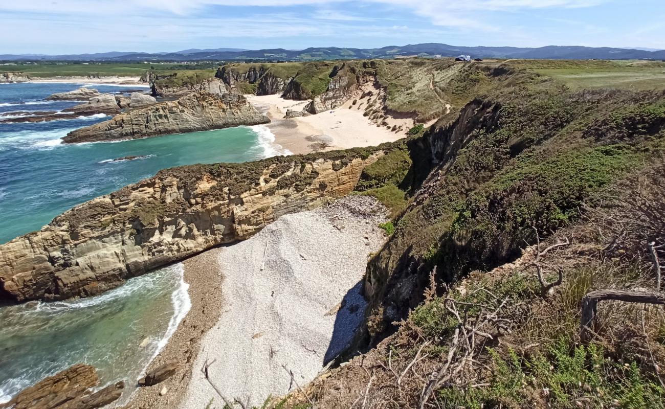 Photo of Playa del Sarello with white sand surface