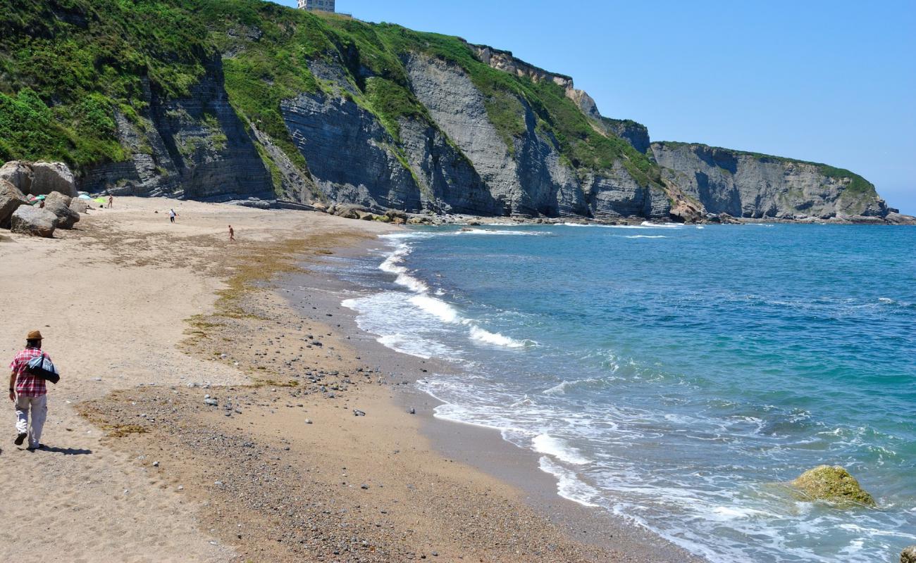 Photo of Playa de Serin with gray sand &  pebble surface