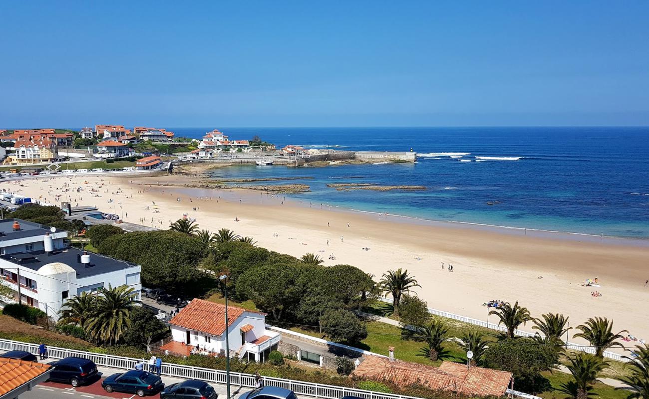 Photo of Comillas Beach with bright fine sand surface