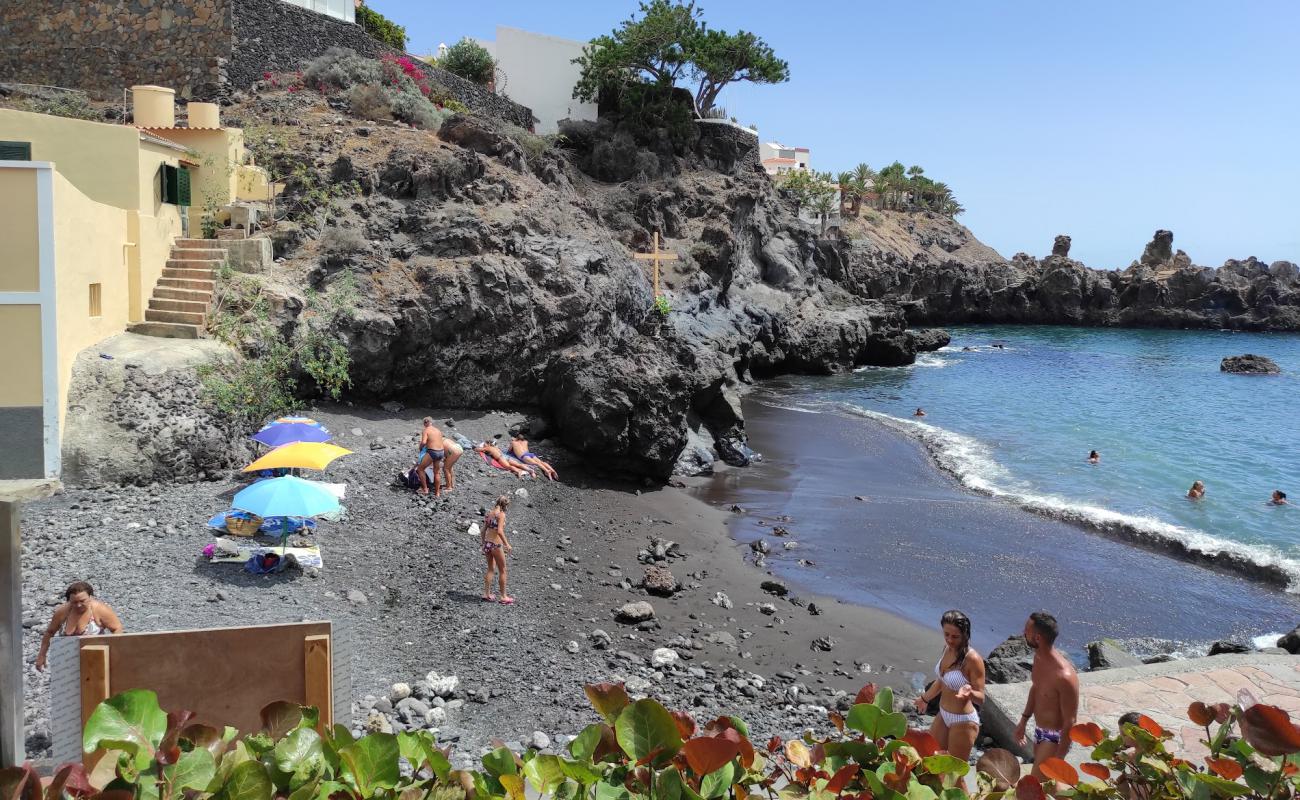 Photo of Alcala Beach with white sand &  rocks surface