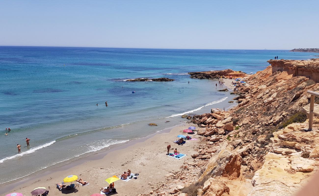 Photo of Cala La Mosca with bright sand surface