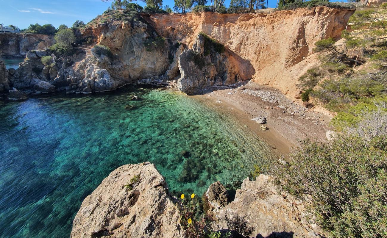 Photo of Platja Cap des Gegant with bright sand & rocks surface