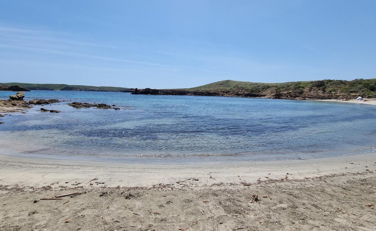 Photo of Cala Tamarells del Nord with bright sand surface